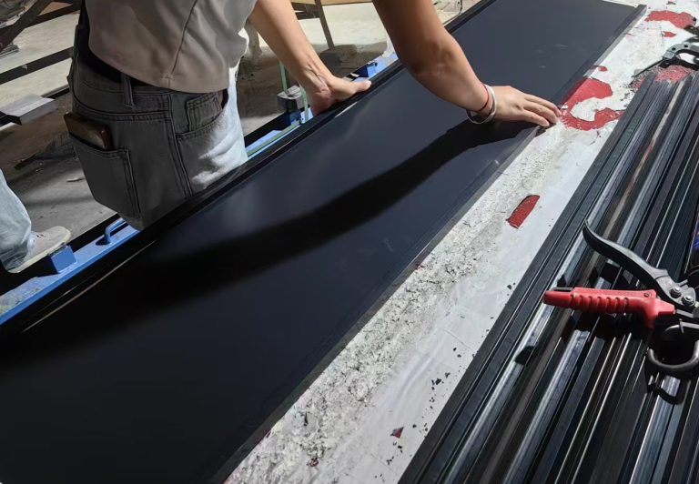 Mirror panels and frame profiles on the assembly bench