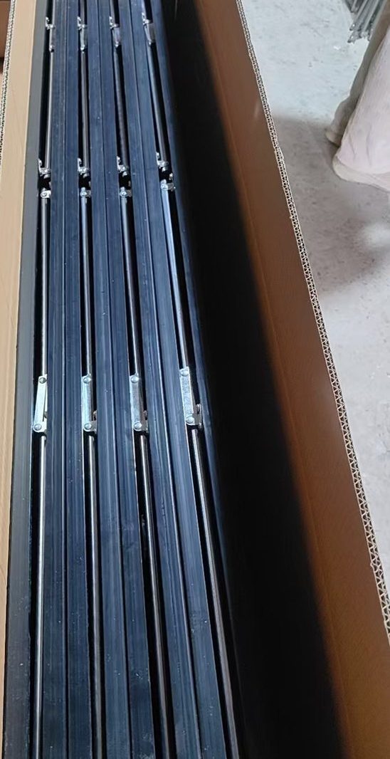 Full-length mirrors packed in an open shipping carton