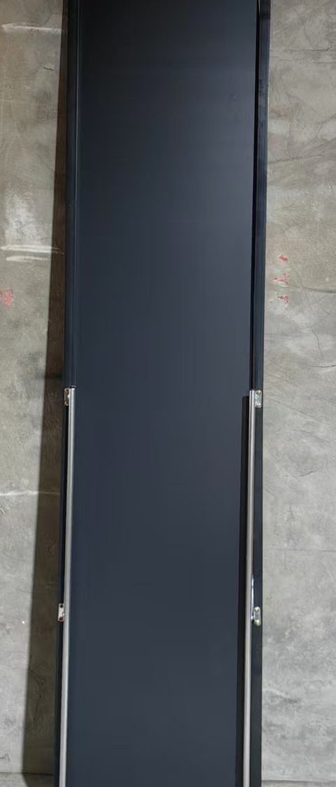 Back of the full-length mirror showing the backing board and folded stand