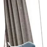 Freestanding full-length mirror with a slim black frame and folding rear easel